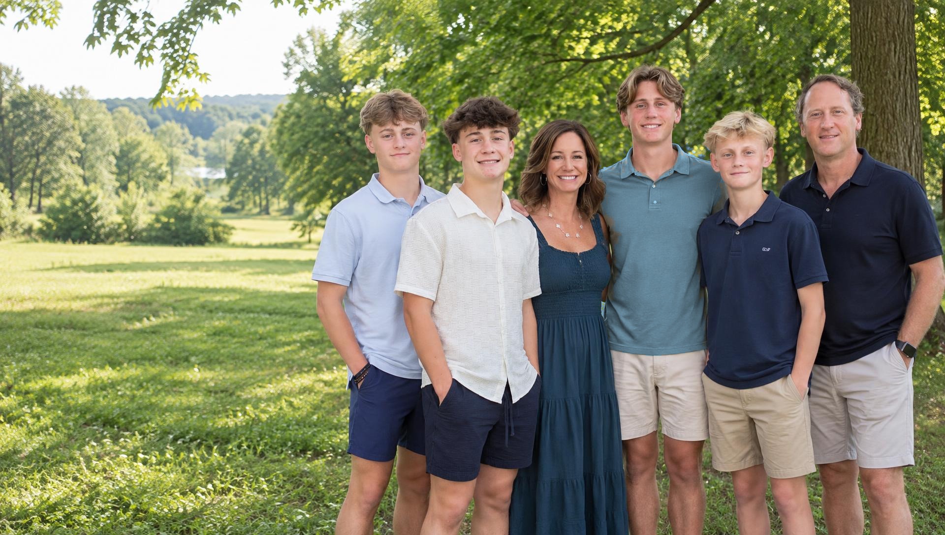An active family hiking together on a sunny trail